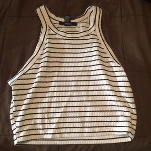 Medium sized black and white striped crop top